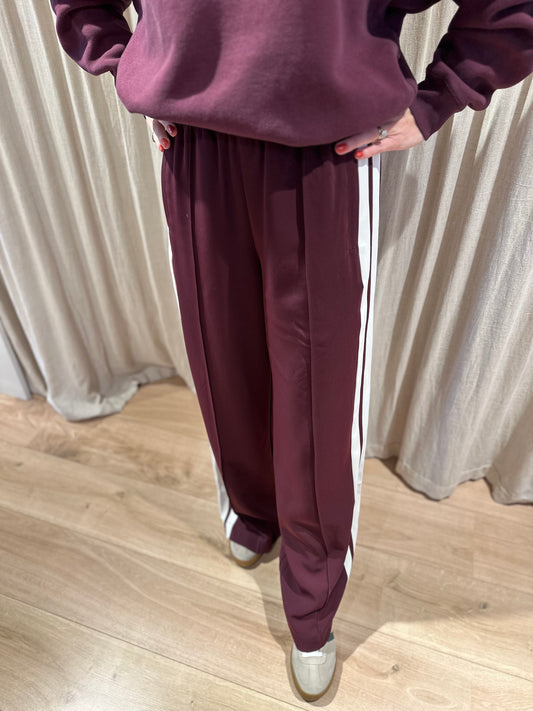 Side button tracksuit trousers - winestating